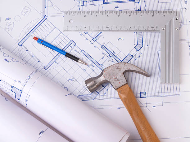 istock Right Angle, hammer and pencil on a blueprint 177296949