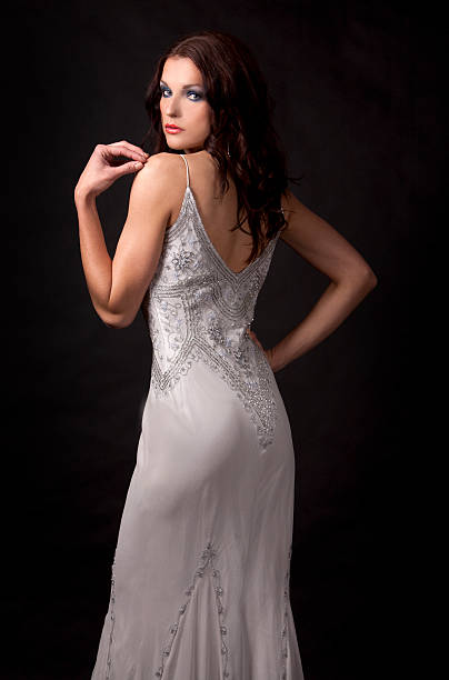 istock brunette in long dress 177297008