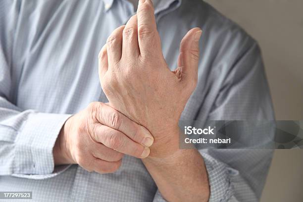 Man Has Pain In Wrist Stock Photo - Download Image Now - Beauty, Business, Businessman