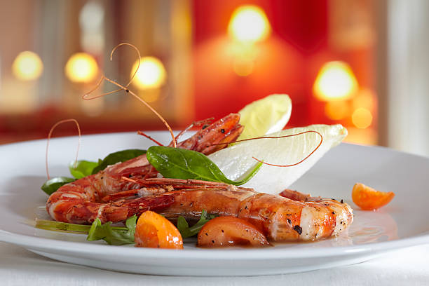 istock fried scampi with mixed salad and cherry tomatoes 177297559