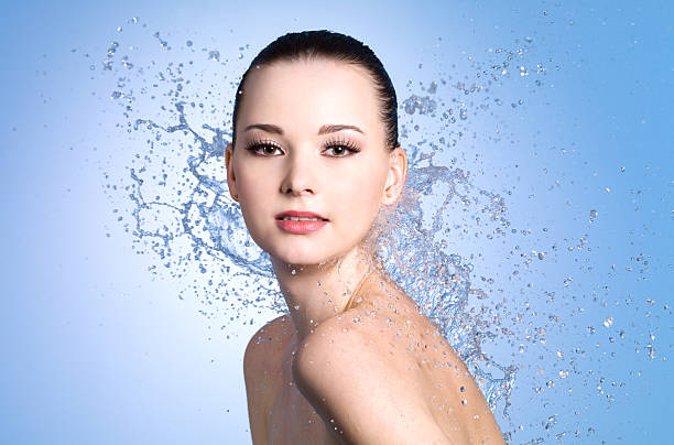 istock Trickles of warm water splashes upon a vibrant model 177298074