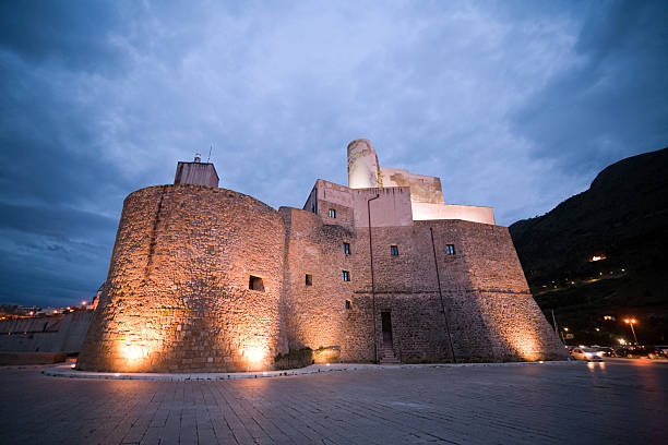 evening view of fortress, Castellammare del Golfo town, Sicily stock photo