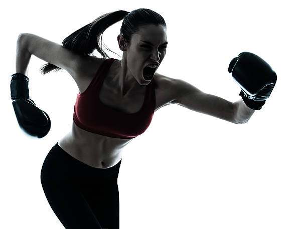 istock beautiful woman exercising boxe 177298201