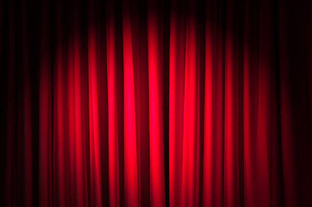 istock Brightly lit curtains in theatre concept 177298450