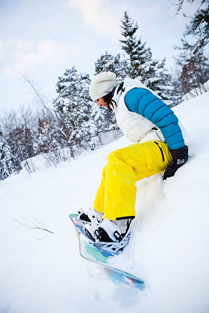 istock Winter woman with snowboard 177298649