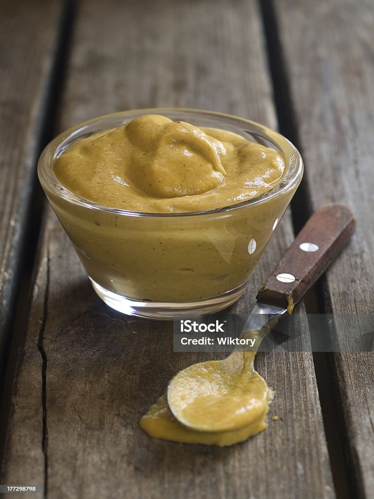 mustard "Mustard sauce in glass bowl, selective focus" Mustard Stock Photo
