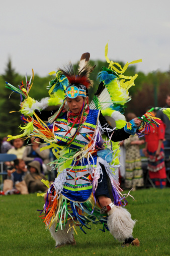 Powwow Dancer movement during a traditional Powwow