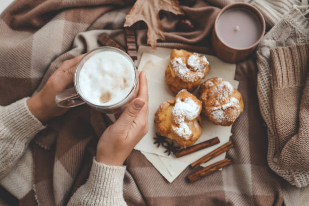 istock Cup of coffee in hands, cozy autumn 1772989697