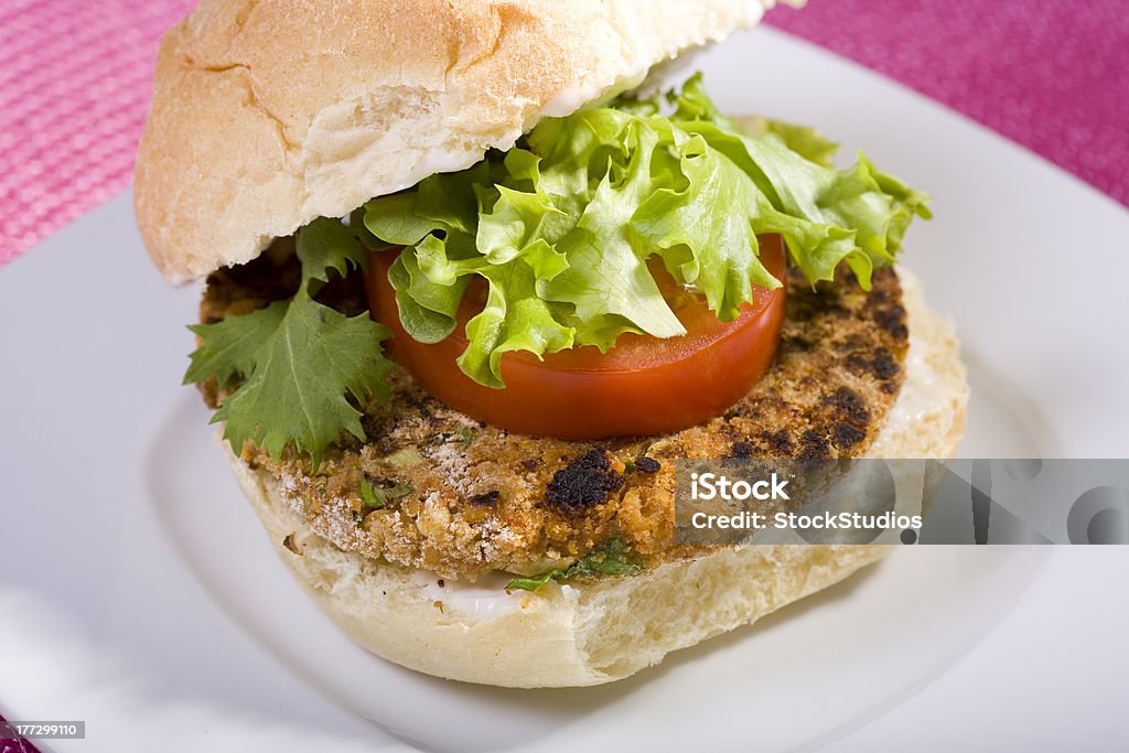 Chickpea Veggie Burger Chickpea Vegan Veggie Burger on a Kaiser Roll with Lettuce Tomato and Vegan Mayo Burger Stock Photo