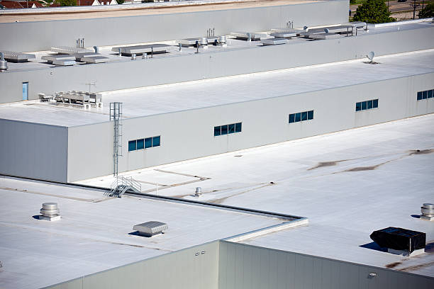 Close-up of the roof of big warehouse building stock photo