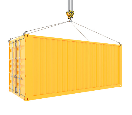 Yellow cargo container hanging from crane hook