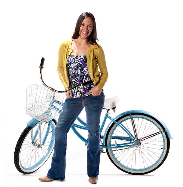 istock Woman with bike on white 177300373