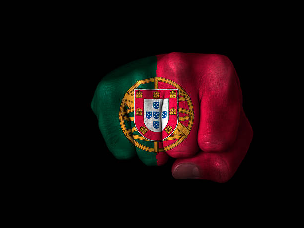 Flag of Portugal painted on closed fist. See other