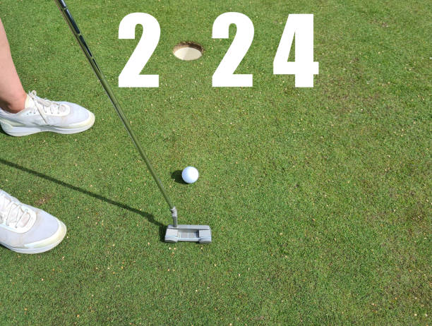 istock Golfer with 2024 golf ball at hole on golf course 1773006812