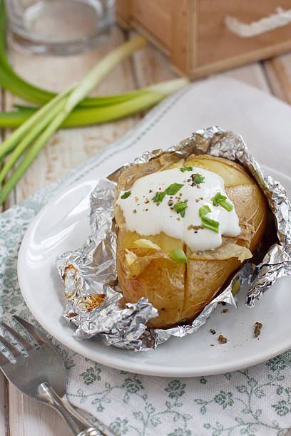 istock Baked potato with sour cream and onion 177301049