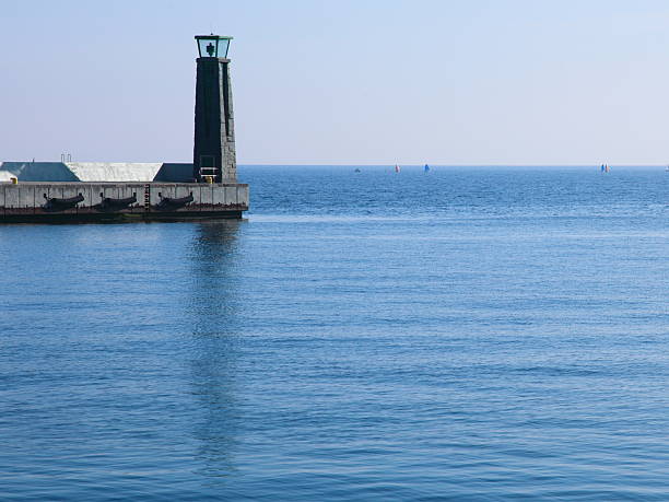 istock lighthouse lamp post breakwater, port detail 177301227