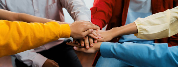 istock Startup company employee team stack hand together symbolize teamwork. Synergic 1773015965