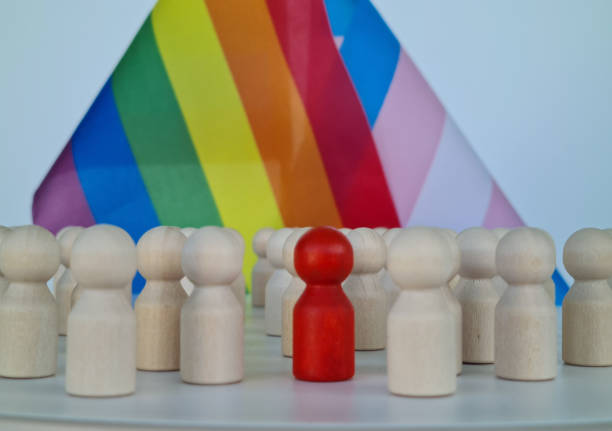 istock People protecting inclusion text and LGBT flag 1773020274