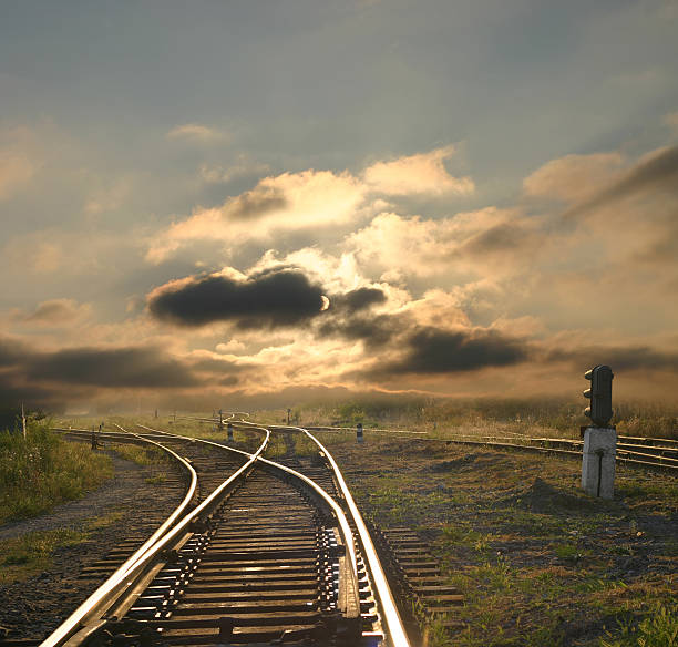 evening landscape with railroad rails