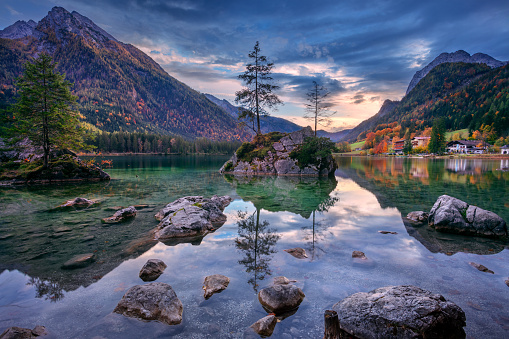 Landscape image of Hintersee Lake located in southern Bavaria, Germany at beautiful autumn sunset.