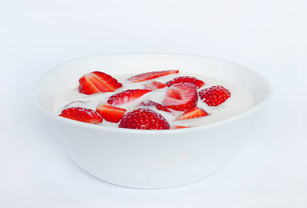 istock bowl of yogurt with strawberries 177302554