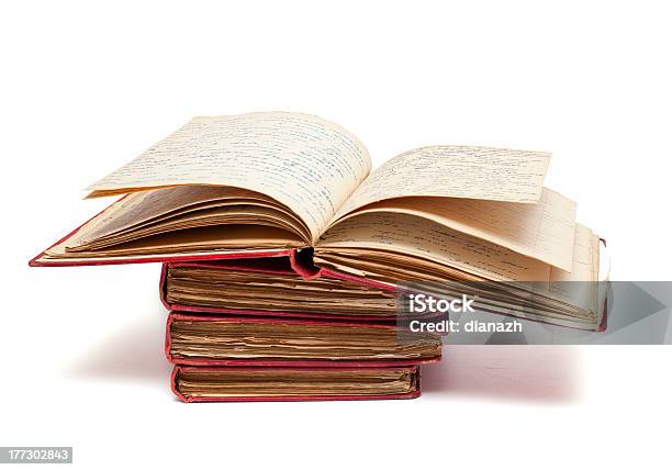 Stack Of Old Books With Red Covers And Open One Stock Photo - Download Image Now - Antique, Book, Book Cover