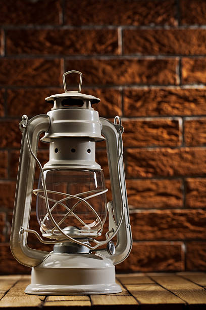 istock white kerosene lamp on background of the brickwall 177302915