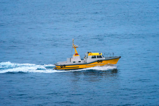 istock A yellow pilot boat speeding on the ocean water 1773034956