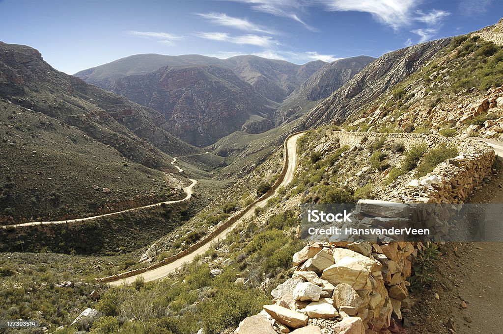 Swartberg Pass An idyllic shot overlooking the historic Swartberg Pass as the road goes down the northern side of the Swartberg Mountains South Africa Stock Photo