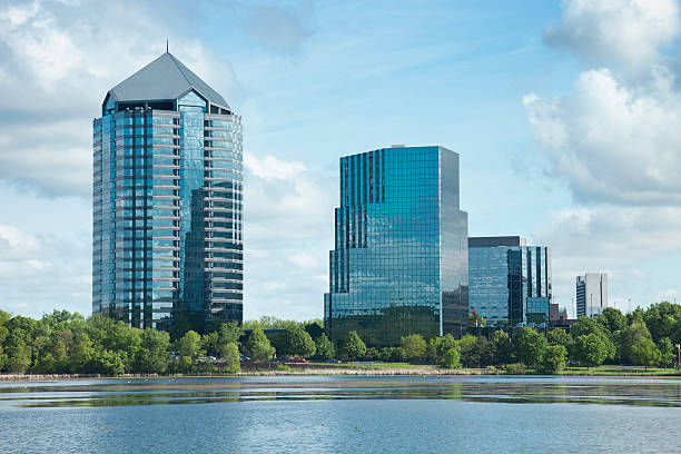 Modern office buildings with lake in foreground