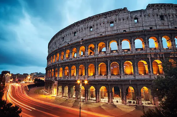 Photo of Coliseum at night in Rome Italy