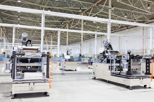 Modern machines in shop at the big enterprisebig factory shop with the modern working equipment