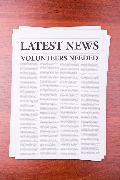 istock The newspaper VOLUNTEERS NEEDED 177304513