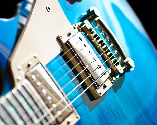 Electric guitar in blue color.