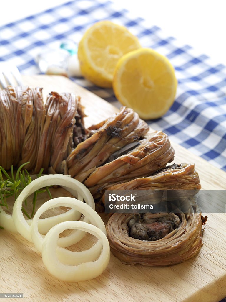 kokoretsi(traditional greek plate) "kokoretsi-traditional and famous greek plate made of chopped lamb liver, wrapped with lamb intestines and baked on a spit on charcoal" Lamb - Animal Stock Photo