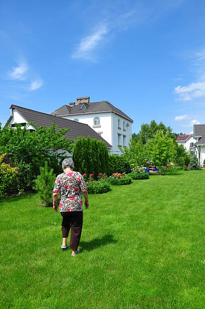 istock woman on garden 177305824