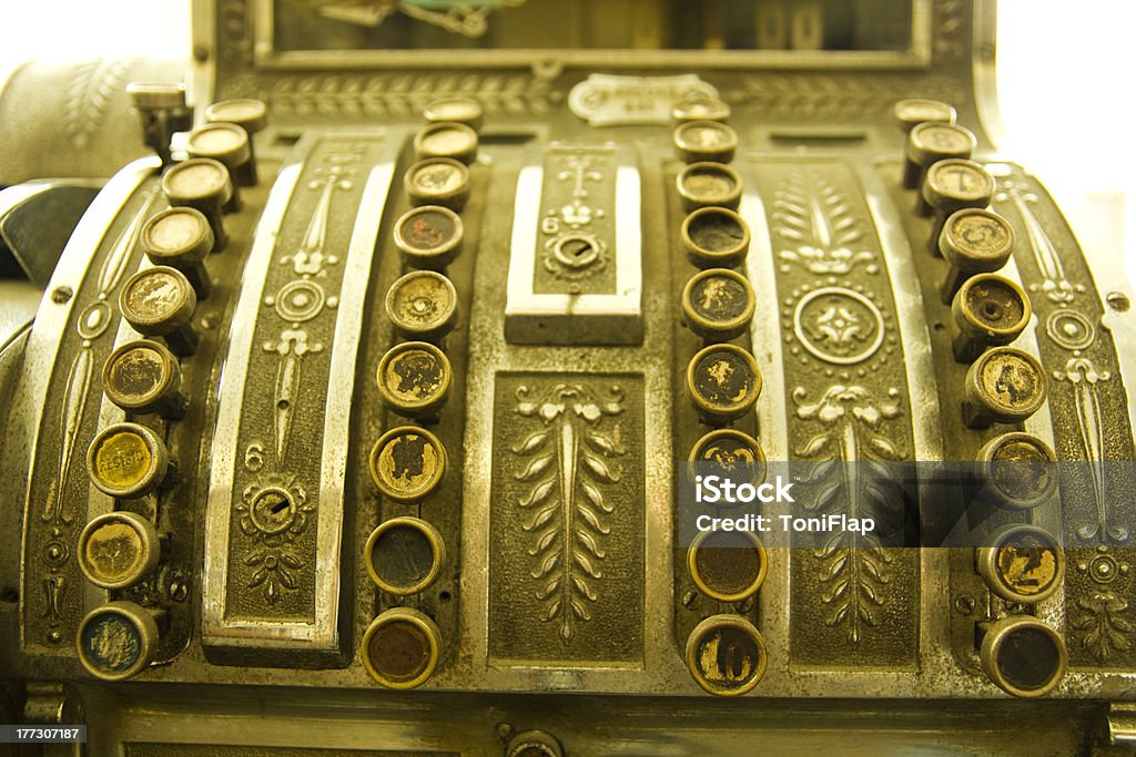 Cash register. "Cash register. Detail of an old cash register, charge in dollars." Old-fashioned Stock Photo