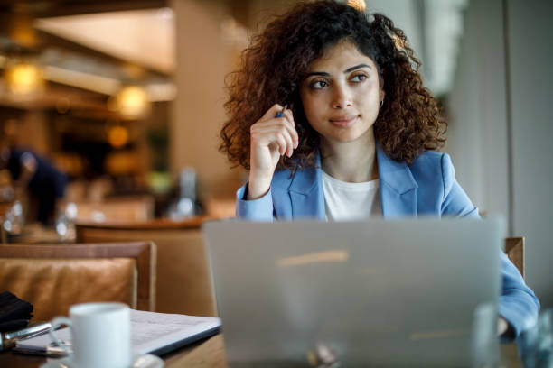istock Businesswoman working online at a cafe 1773071945