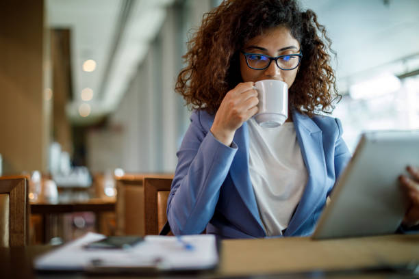 istock Businesswoman taking a break at cafe 1773071979