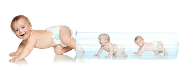 Baby getting out of the tube Baby getting out of the tube. Artificial Insemination. In Vitro Fertilization in vitro fertilization photos stock pictures, royalty-free photos & images