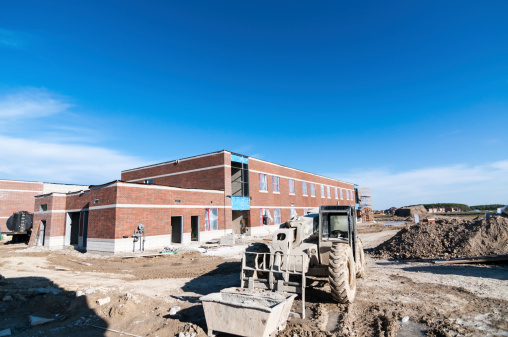 A new elementary school under construction in a suburban neighborhood.