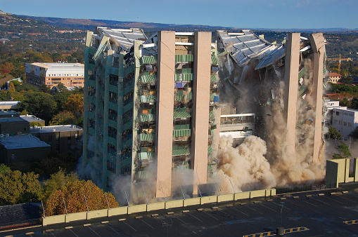 Building demolition by implosion - image 5 of a 10 shot sequence