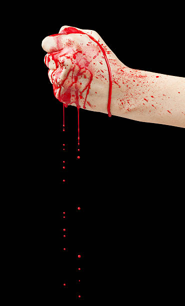 Bloody fist isolated on a black background