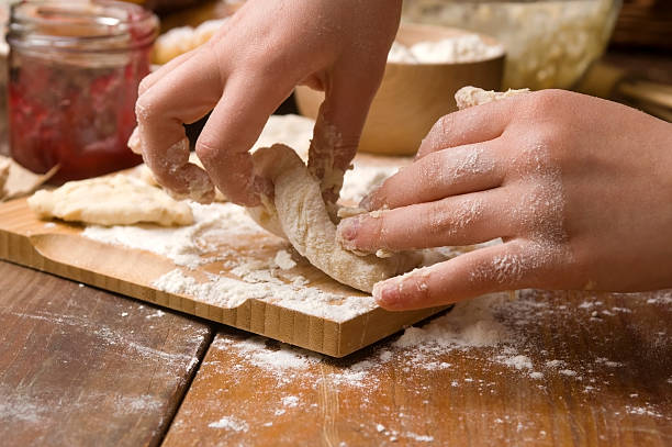 istock Detail of hands kneading dough 177311030
