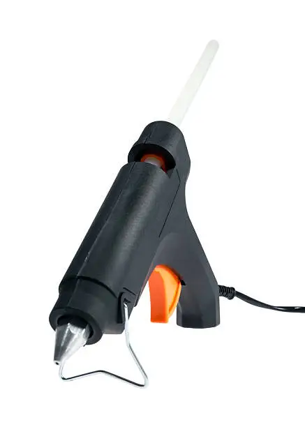 Electric hot glue gun isolated on a white background.