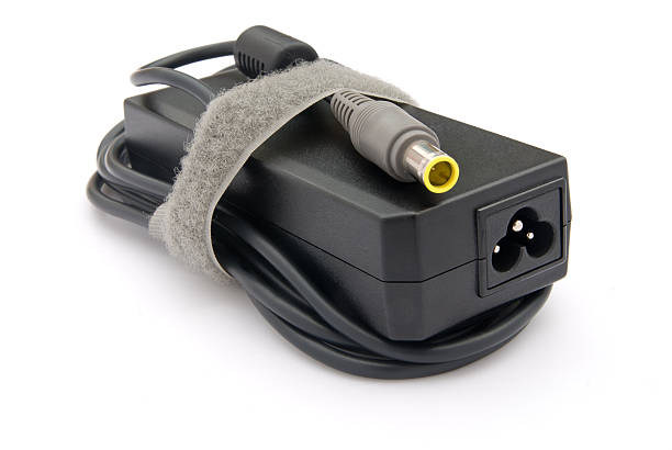 black Laptop AC adapter with tie on white