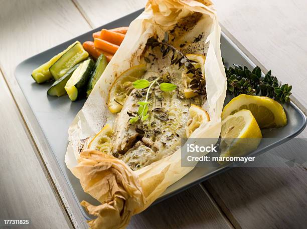 Sole Fish Cocked In A Wrapper Stock Photo - Download Image Now - Fish, Husk, Carrot