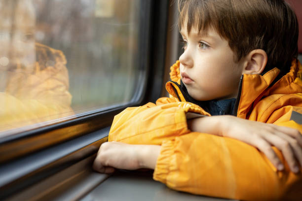 istock 6 year old boy rides in a train carriage 1773122808