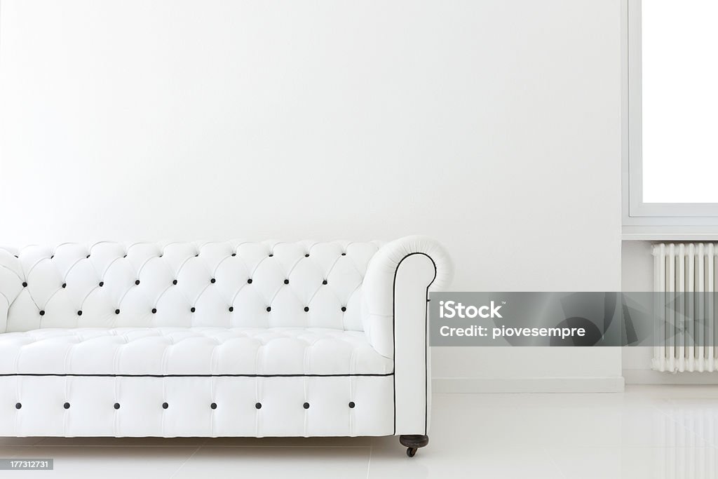 sofa  in white room "interior, leather sofa  in white room" Close-up Stock Photo