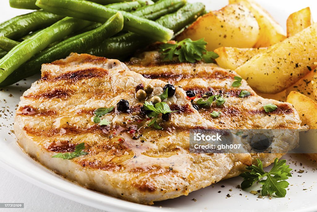 Grilled meat and vegetables Grilled chicken fillet and vegetables More ... Baked Potato Stock Photo